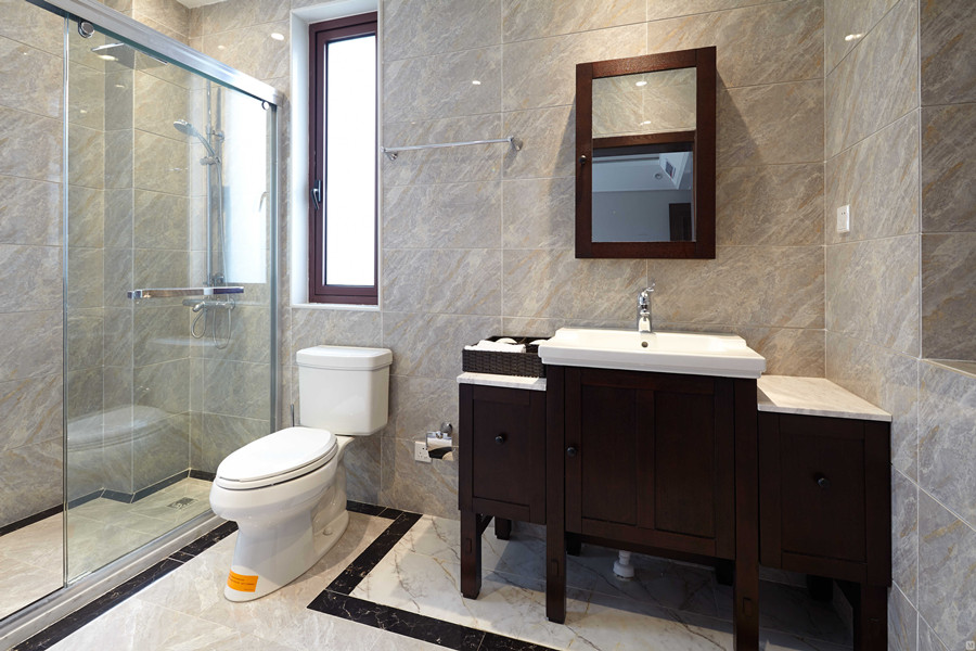 A Tile-Filled Bathroom in a Light Steel Villa